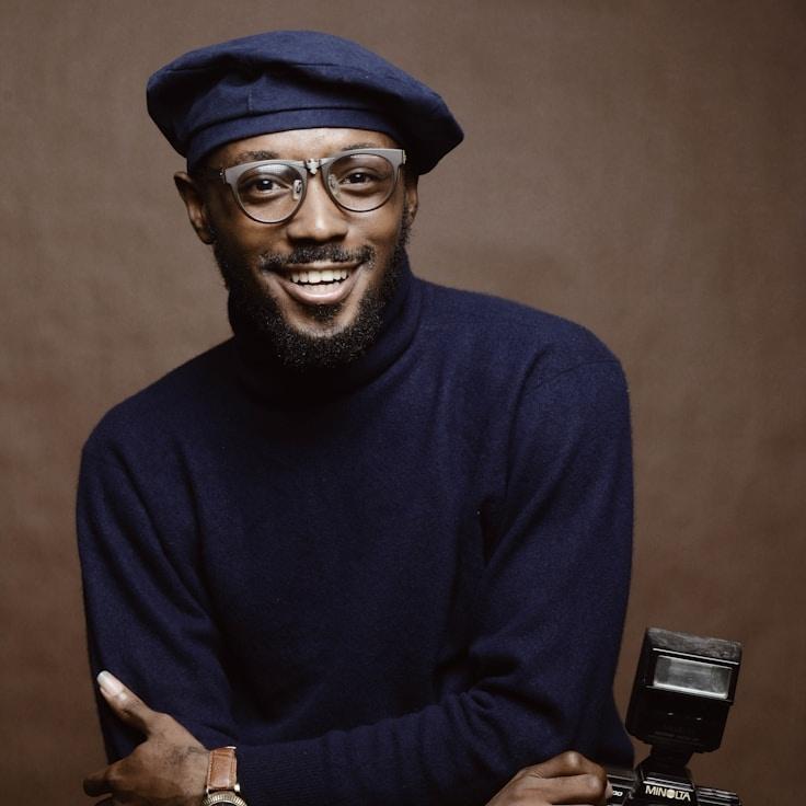 Avery Kline, Lead Design Curator at Digital Trend Platform, reviewing corporate floral arrangements